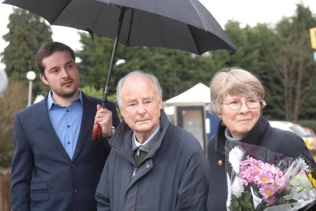 Left to right: Bill's nephew Cam Hendry, brother Neil Hendry and Neil's wife Barbara at the scene of the incident.