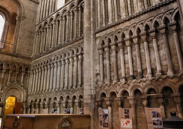 Norman arches pattern a wall in Ely Cathedral. (Copyright - David Winpenny)