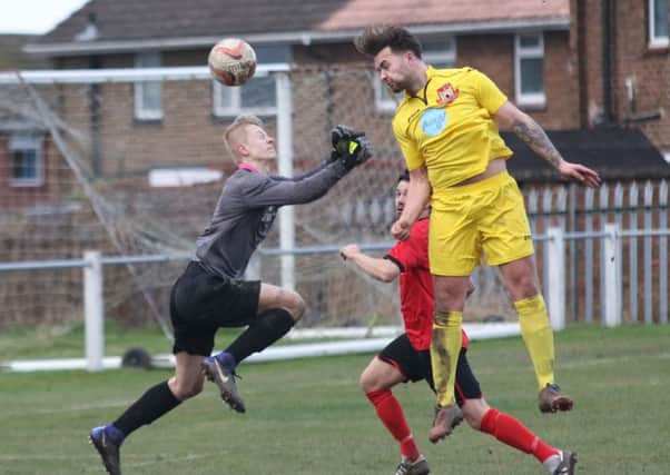 Fraser Lancaster heads in Knaresborough Town's third goal in their win at Ollerton. Picture: Craig Dinsdale