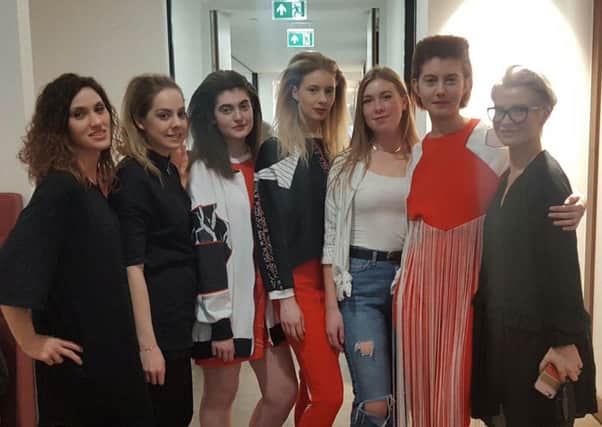 Rita Tuska, Elaine Sneddon and Marzena Serafin (dressed in all black) with models and the designer at London Fashion Week.