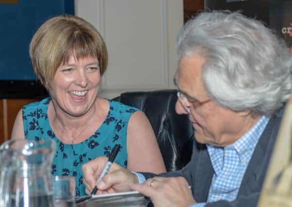 Raworths managing partner Zoe Robinson with TV journalist John Suchet at the 2016 Raworths Harrogate Literature Festival.