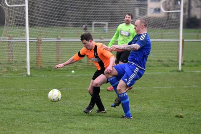 Wetherby Athletic's Jony Brown halts a Carlton Athletic attack. Picture: Pete Arnett