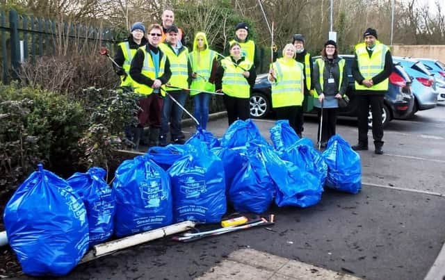 Staff and councillors from Harrogate Borough Council and McDonalds litter picking at Grange Quarry in Harrogate as part of the Great British Spring Clean.