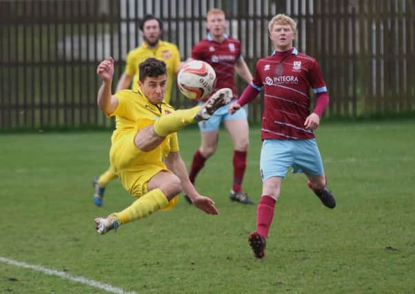 Ben Cohen in action for Knaresborough Town during Saturday's defeat at AFC Emley. Picture: Craig Dinsdale