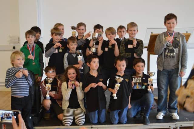 Winners pose with their trophies at the Harrogate and District Primary Schools Chess Congress.