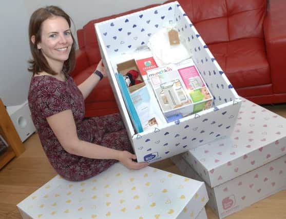 Mum-of-two Toni Kitchen has launched Arvossa, a firm that makes cardboard cribs filled with useful baby items.