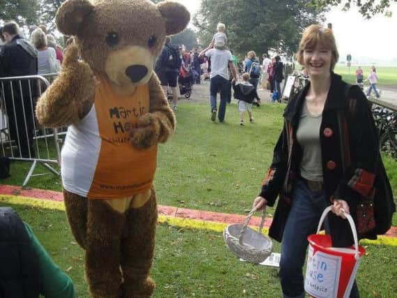 Naomi Barrow in full mascot costume with her mother, Dr Fiona Hicks, at a fundraiser for Martin House Hospice for Children and Young People