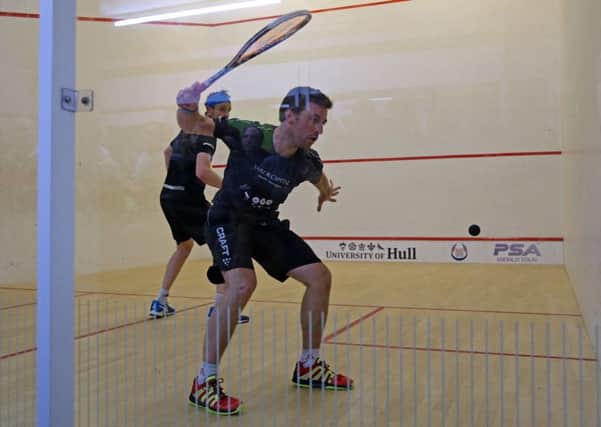 James Willstrop, left, on his way to a first round defeat to France's Mathieu Castagenet. Picture courtesy of PSA.