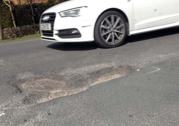 Pot holes on Beckwith Road. (1704304AM4)