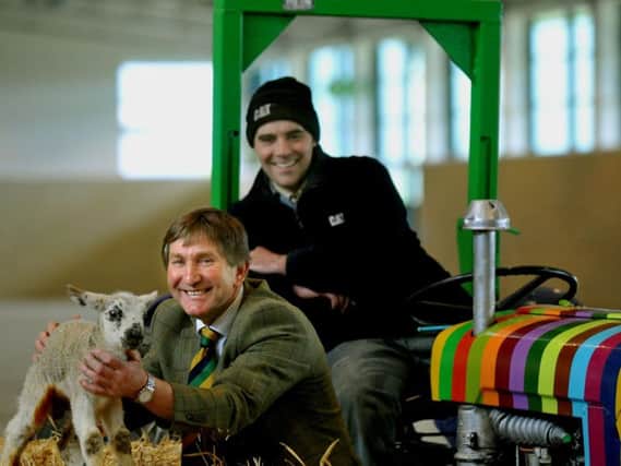 Charles Mills the Yorkshire Agricultural Society Show Director (left) with farmer Chris Heslop and one of his lambs getting ready for Springtime Live. Picture: Gary Longbottom