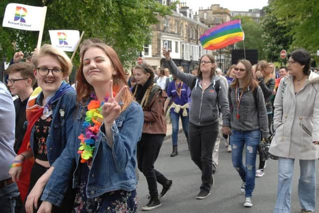 Crowds celebrated diversity in Harrogate by joining in with the march. Picture: Adrian Murray
