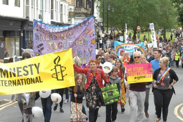 Crowds celebrated diversity in Harrogate by joining in with the march. Picture: Adrian Murray