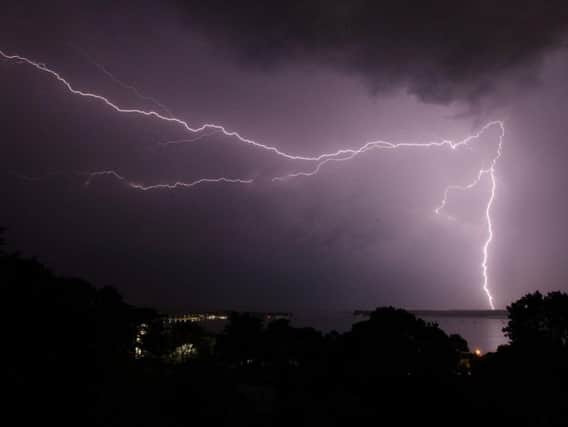 Lightning strikes over Poole harbour in Dorset as thunderstorms swept across parts of south west England after much of the country basked in sunshine and clear skies for the last few days. The storm is now heading north.