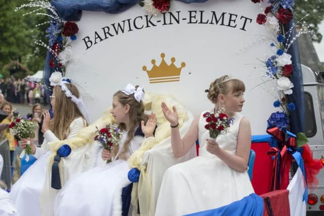 29 May 2017.
The Barwick-In-Elmet Maypole Festival parade makes its way down Main Street in the village.
Maypole Queen Eliza Vipond with her attendants.