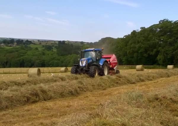 Baling silage down the dale. It was then wrapped and taken back home.