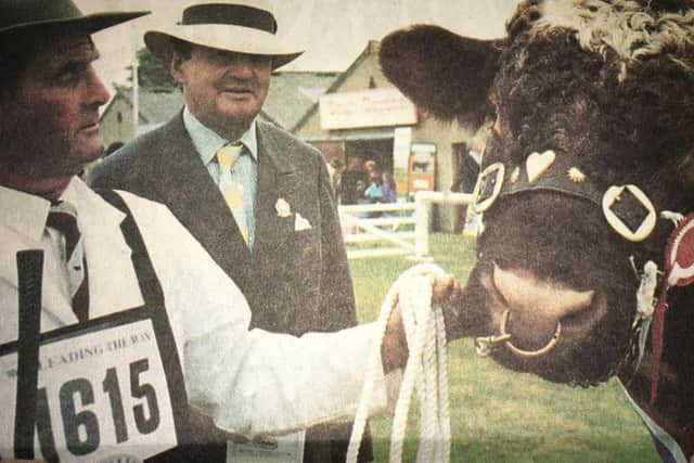 Manager Mr Ray Sanderson (left) and owner Mr Michael Abrahams pictured with their overall beef shothorn champion. It finished third overall in the championship.
