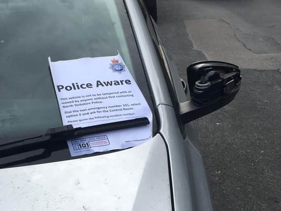 Cars have been left with notices by North Yorkshire Police. Picture: David Simister