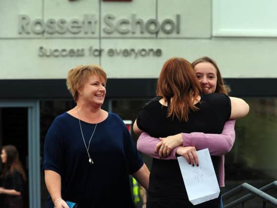 Students celebrate getting there a level exam results at Rossett School, Harrogate.