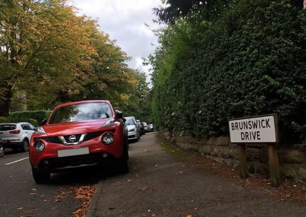 This section of Brunswick Drive on the Duchy estate is just outside the area of restricted disc parking. This is a typical scene throughout the working day.