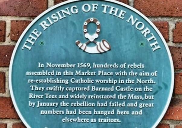 The Civic Societys green plaque about the Rising of the North. (Copyright - David Winpenny)