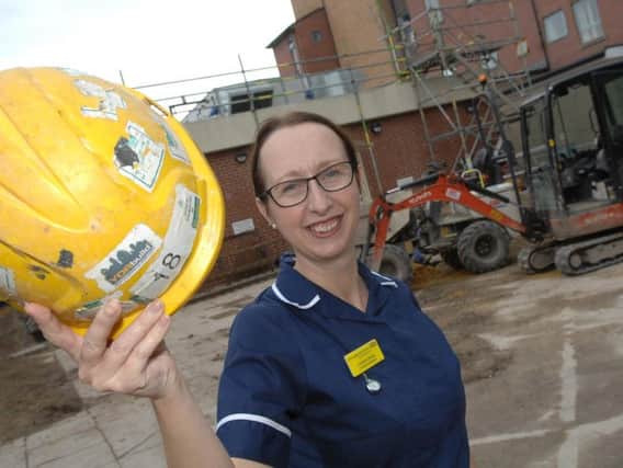 Endoscopy Suite Manager, Lorraine Dyson shows where the new unit will stand this time next year. Picture: Adrian Murray