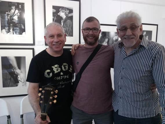 'In Conversation' at The Las's 1987 Exhibition at RedHouse Originals Gallery in Harrogate -  ex-The La's Paul Hemmings, Graham Chalmers of the Harrogate Advertiser, and photographer Jake Summerton.