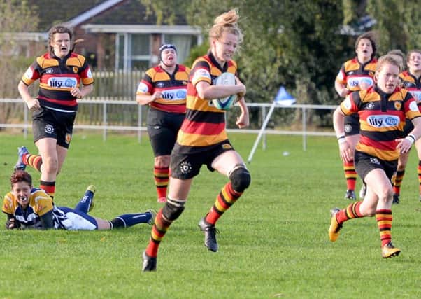 Harrogate RUFC Ladies' fly-half Rose Jay races away towards the York RI try-line. Picture: Richard Bown