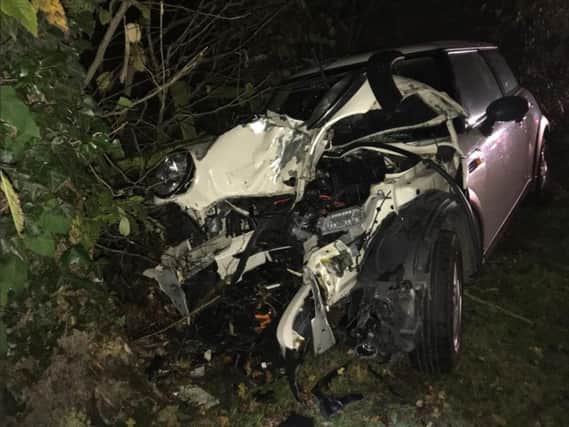 The white Mini One was left 'smouldering' after it hit a tree in Farnham near Knaresborough. Credit: Acting Insp. Paul Cording