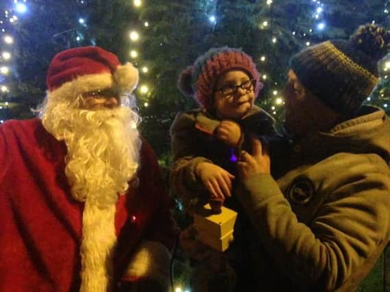 Starbeck boy Noah Maguire switched on the Christmas lights.