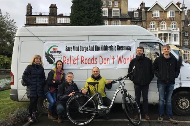 Some of the members of the public against a relief road gathering before the North Yorkshire County Council meeting. (Picture by Hollie Bone)