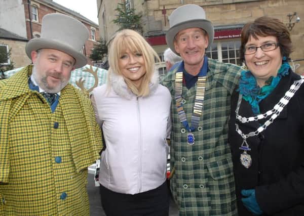 NAWN 1712101AM Wetherby Dickensian Market. Stuart Newcombe, Calendar's Christine Talbot, Preident of The Wetherby Lions John Boulton and The Mayor of Wetherby  Coun. Norman Harrington. (1712101AM)
