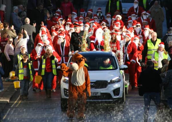 Pateley Bridge High Street was packed with Santas on Saturday.