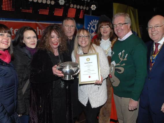 The Mayor of the Borough of Harrogate Coun Anne Jones, chairman of Harrogate at Christmas John Fox and  President of Rotary Club of Harrogate Graham Saunders with overall winners Geogina Collins and  Laura Livingstone of Bijouled with guests Mike Thompson, Ruth Sprowell and Carla Wise. (1711162AM18).