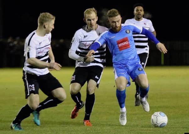 George Thomson in action during Harrogate Town's Boxing day defeat at Darlington. Picture: Town Pix
