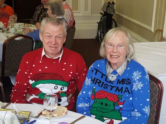 Opening Doors guests, Joan and Lester Martin, getting into the festive spirit