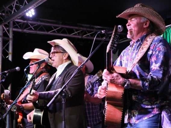 Arts 2017 highlight - Paul Young in a cowboy hat, right, performing with Squeeze's Chris Difford at The Warehouse Recording Co in Harrogate. (Picture by Stuart Rhodes)