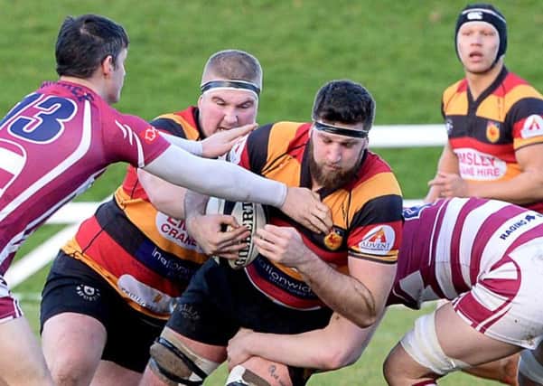 Harrogate RUFC powerhouse Sam Brady looks for a way through the Wirral  defence during Saturdays National Three North clash. Picture: Richard Bown