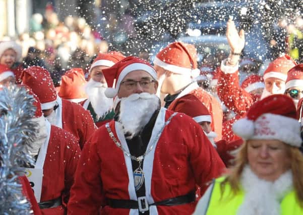 The Santa Run was well attended and artificial snow was provided to add extra festivity.