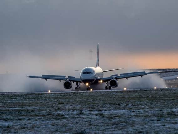 A British Airways flight from Heathrow lands in the snow (Charlotte Graham)