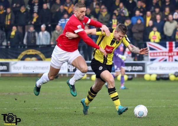 Louie Swain in action during Harrogate Town's loss at Salford City. Picture: Town Pix