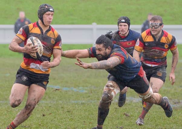 Harrogate RUFC's Keane Naylor outstrips the Kirkby Lonsdale defence. Picture: Richard Bown