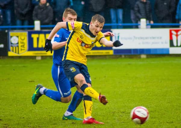 Casey Stewart shoots for goal during the Evo-Stik League First Division North match between Tadcaster Albion and Glossop North End. Picture: Matthew Appleby