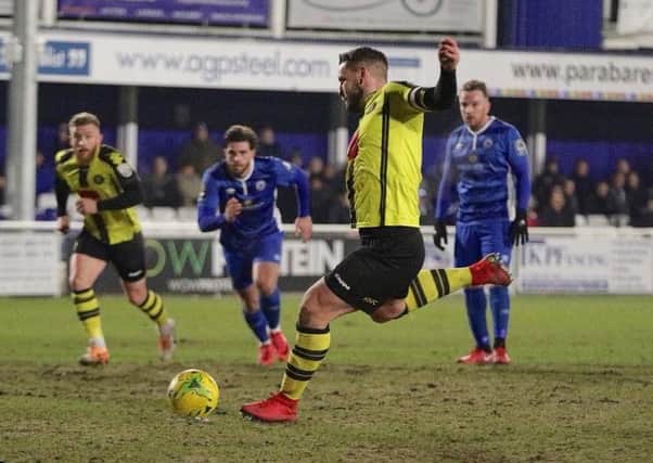 Simon Ainge converts from the penalty spot in Tuesday night's FA Trophy replay at Billericay. Picture: Town Pix