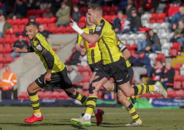 Joe Leesley celebrates after firing Harrogate Town into the lead at Kidderminster. Picture: Town Pix