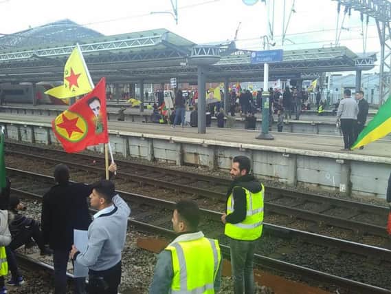 Protesters were on the train tracks at Manchester Piccadilly railway station. Picture: PA Wire.