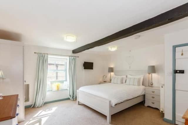 Guests love the exposed beams in the bedrooms