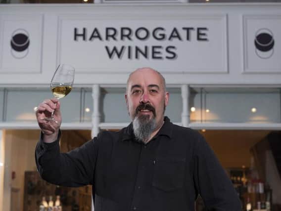 Harrogate Wines owner Andy Langshaw toasts the launch of a dedicated wine-tasting event space above his shop (s).