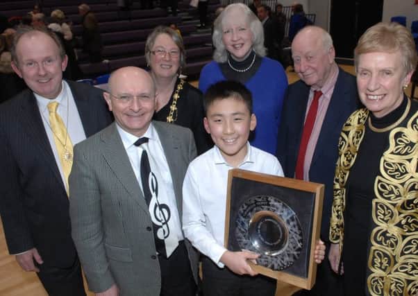 Winner of The Young Musician of the Festival pianist Yuan Xu(12) with adjudicator Andrew Padmore, Andrew Willoughby consort to the deputy mayor of Harrogate, The Deputy Mayor of Harrogate  coun. Christine Willoughby, adjudicator Jacqui Edwards, President of Harrogate Competitive Festival for Music Speech and Drama Richard Thomas and adjudicator Marilynne Davies   (1803171AM5)