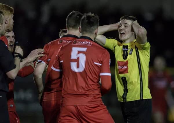 Liam Kitching was sent off as Harrogate Town endured a disappointing evening against Spennymoor. Picture: Caught Light Photography