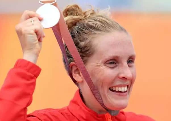 Jess Learmonth with England's first medal of the 2018 Commonwealth Games